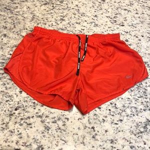 Nike Dri Fit Women’s Running shorts, Red/Orange, size Medium